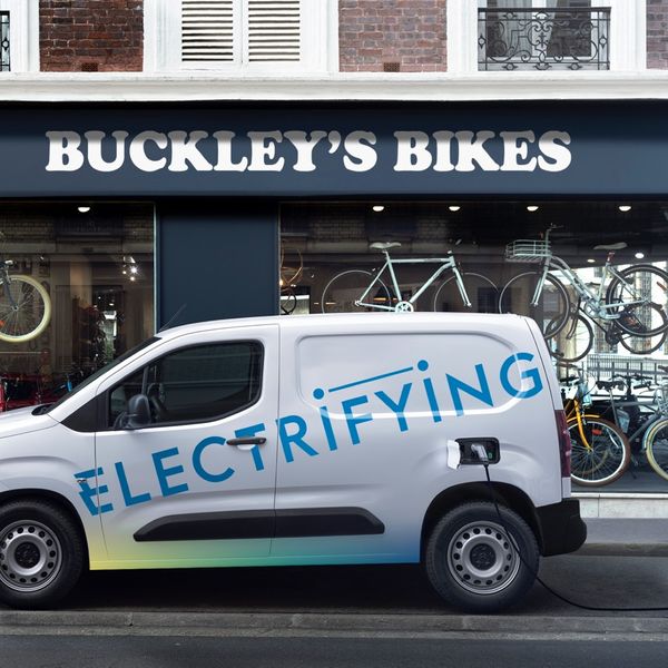 Citreon Berlingo electric Vans parked outside shop